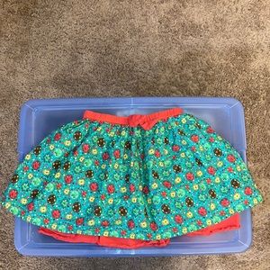 Wellie Wishers from American Girl teal red yellow brown print skirt size 7